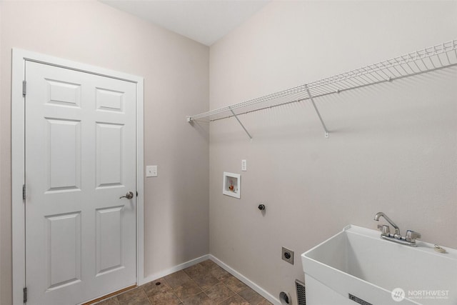 8315 Vashon Dr NE, Lacey, WA 98516 - laundry room with electric dryer hookup, washer hookup, and baseboards
