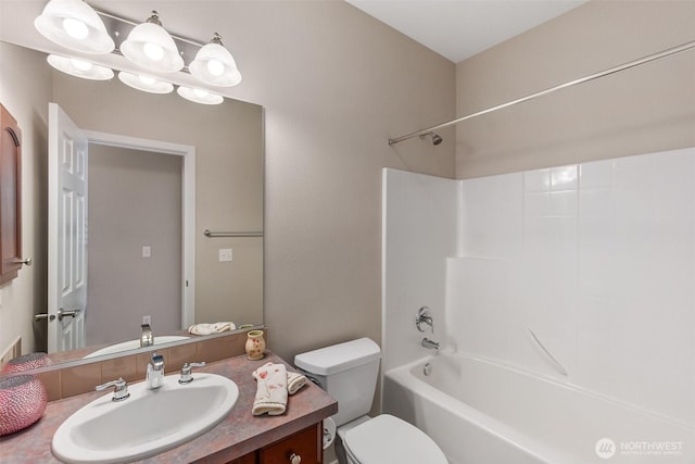 8315 Vashon Dr NE, Lacey, WA 98516 - full bathroom with toilet, vanity, and shower / bath combination