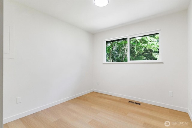 5410 240th St SW, Mountlake Terrace, WA 98043 - unfurnished room with light wood-type flooring and baseboards
