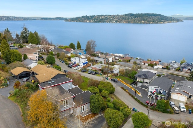 10445 Dixon Dr S, Seattle, WA 98178 - aerial perspective of suburban area with property parcel outlined and a nearby body of water