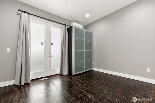 10445 Dixon Dr S, Seattle, WA 98178 - unfurnished room with hardwood / wood-style floors, baseboards, and french doors