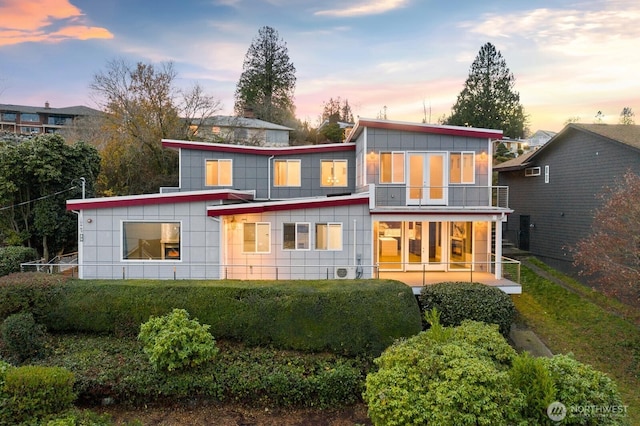 10445 Dixon Dr S, Seattle, WA 98178 - back of house with a balcony and board and batten siding