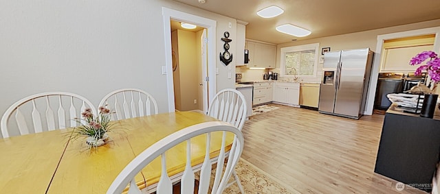 3060 NE Wheeler St, Poulsbo, WA 98370 - dining room featuring light wood-style floors