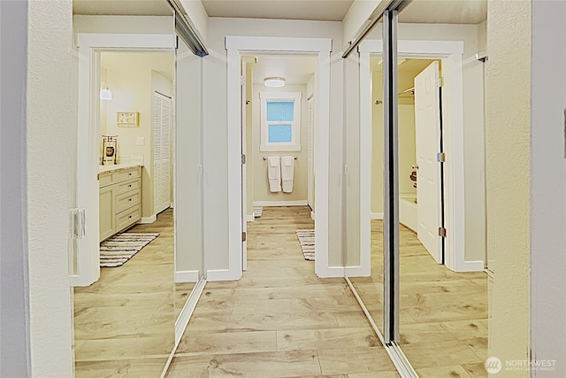 3060 NE Wheeler St, Poulsbo, WA 98370 - corridor featuring light wood-type flooring