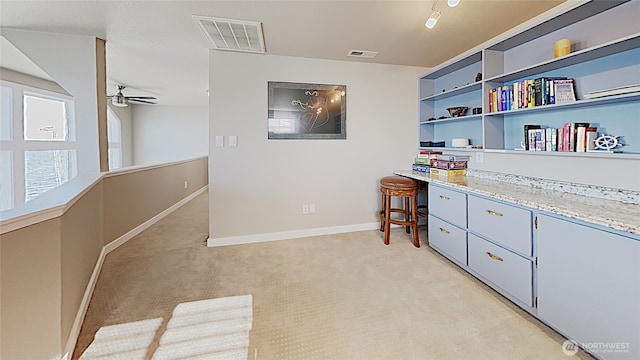 3060 NE Wheeler St, Poulsbo, WA 98370 - office area featuring light colored carpet, baseboards, and a ceiling fan