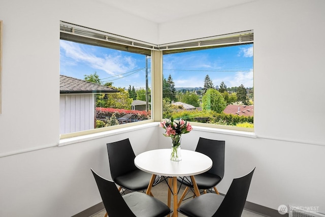 6085 Ann Arbor Ave NE, Seattle, WA 98115 - dining room featuring baseboards