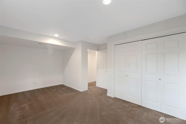 1126 24th Ave, Seattle, WA 98122 - unfurnished bedroom with carpet floors, baseboards, and a closet