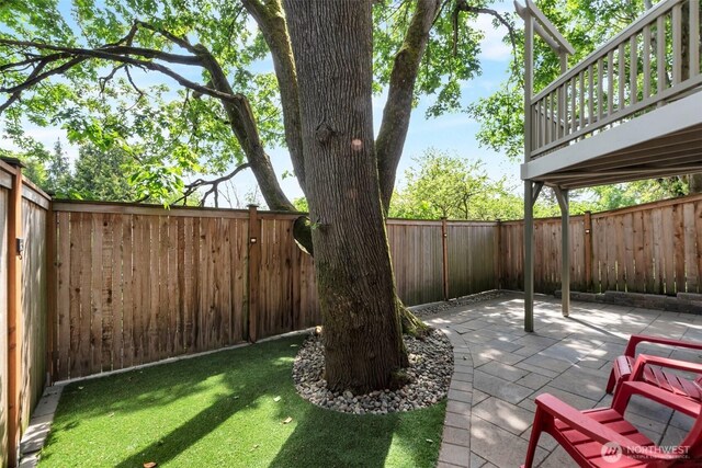 1126 24th Ave, Seattle, WA 98122 - fenced backyard with a patio