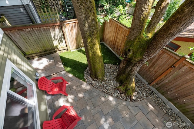 1126 24th Ave, Seattle, WA 98122 - fenced backyard with a patio