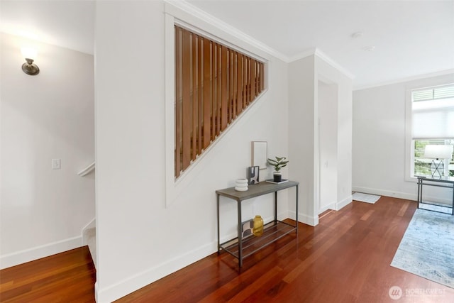 1126 24th Ave, Seattle, WA 98122 - hallway with stairs, wood finished floors, baseboards, and crown molding