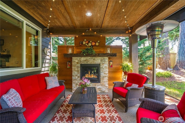 7203 Myers Rd E, Bonney Lake, WA 98391 - view of patio / terrace with an outdoor living space with a fireplace