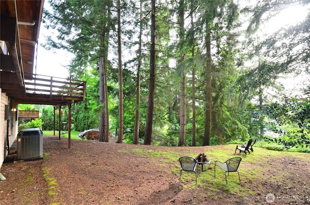 18215 108th Ave NE, Bothell, WA 98011 - view of yard with central AC and an outdoor fire pit
