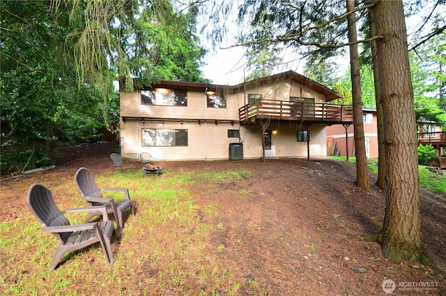 18215 108th Ave NE, Bothell, WA 98011 - rear view of house featuring a wooden deck and cooling unit