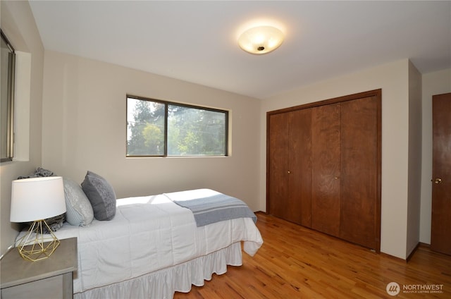 18215 108th Ave NE, Bothell, WA 98011 - bedroom featuring wood finished floors and a closet