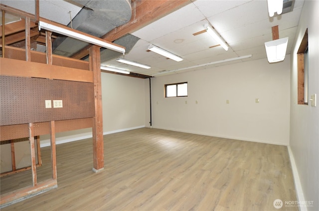 18215 108th Ave NE, Bothell, WA 98011 - below grade area featuring wood finished floors and baseboards