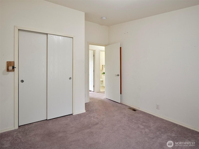 7127 Ortelius Dr, Ilwaco, WA 98624 - unfurnished bedroom with carpet floors and a closet
