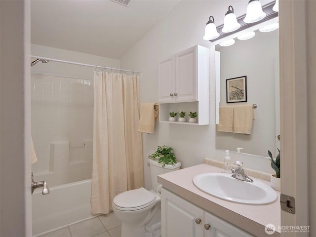 7127 Ortelius Dr, Ilwaco, WA 98624 - bathroom featuring toilet, tile patterned flooring, vanity, and shower / tub combo with curtain