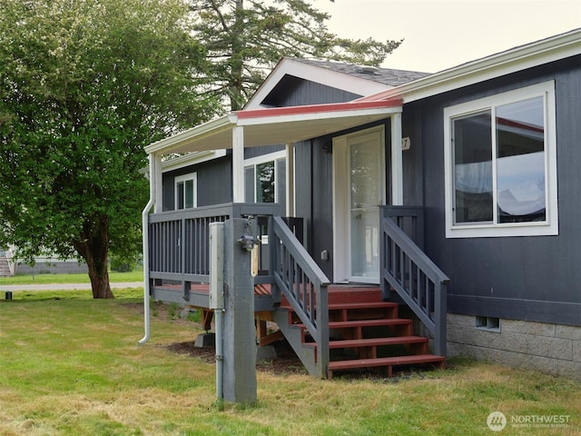 7127 Ortelius Dr, Ilwaco, WA 98624 - entrance to property with crawl space and a lawn