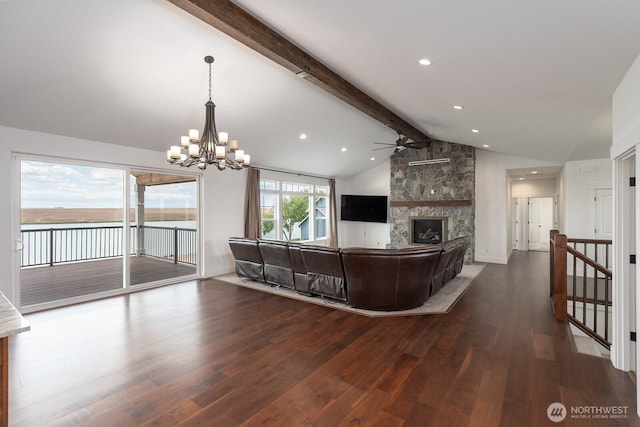7328 Stonecrest Rd NE, Moses Lake, WA 98837 - living area featuring ceiling fan, wood finished floors, beam ceiling, a large fireplace, and a chandelier
