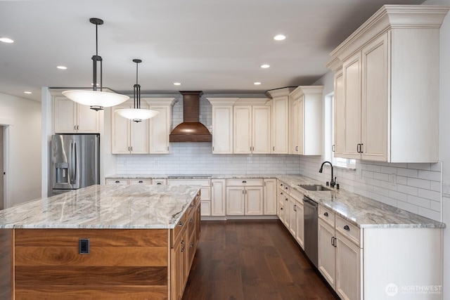 7328 Stonecrest Rd NE, Moses Lake, WA 98837 - kitchen with stainless steel appliances, custom exhaust hood, a sink, dark wood-style floors, and a kitchen island