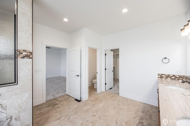 7328 Stonecrest Rd NE, Moses Lake, WA 98837 - bathroom with vanity, toilet, and recessed lighting