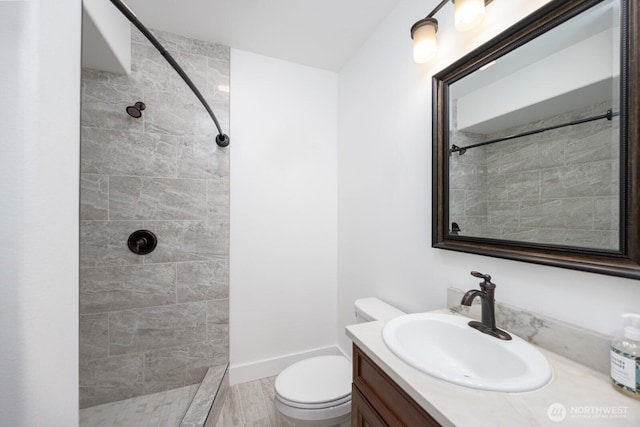 7328 Stonecrest Rd NE, Moses Lake, WA 98837 - bathroom with tiled shower, vanity, and toilet