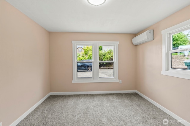 2914 Columbia Heights Rd, Longview, WA 98632 - carpeted empty room with an AC wall unit and baseboards