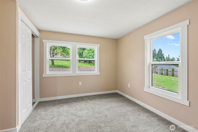 2914 Columbia Heights Rd, Longview, WA 98632 - unfurnished bedroom featuring carpet flooring, baseboards, and a closet
