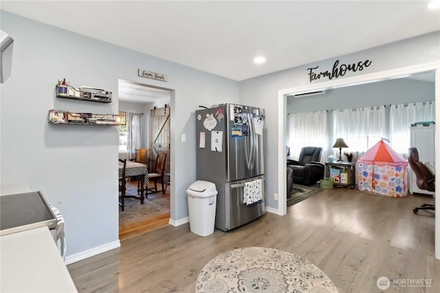 2337 W Castleman St, Longview, WA 98632 - playroom with light wood-style flooring, recessed lighting, and baseboards