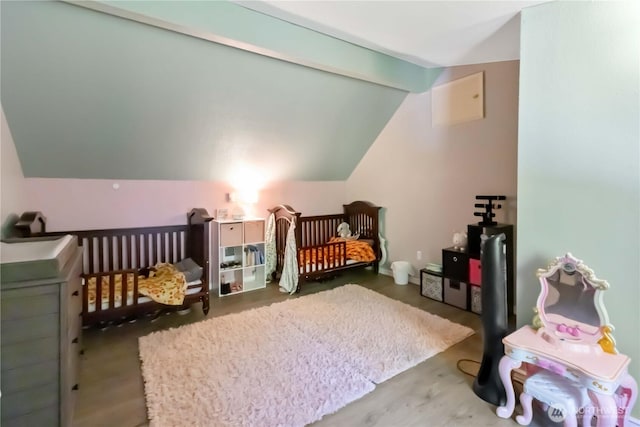 2337 W Castleman St, Longview, WA 98632 - bedroom with lofted ceiling and a crib