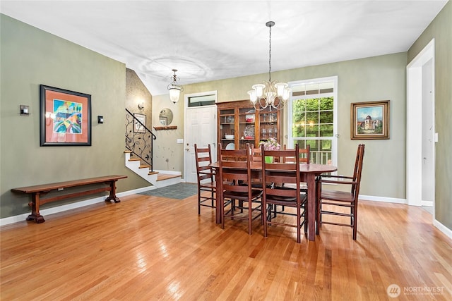 1933 Valleybrook Ln, Bellingham, WA 98229 - dining area with wood finished floors, stairway, a chandelier, and baseboards