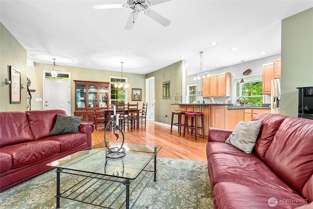 1933 Valleybrook Ln, Bellingham, WA 98229 - living area featuring ceiling fan, light wood-style flooring, a chandelier, recessed lighting, and baseboards