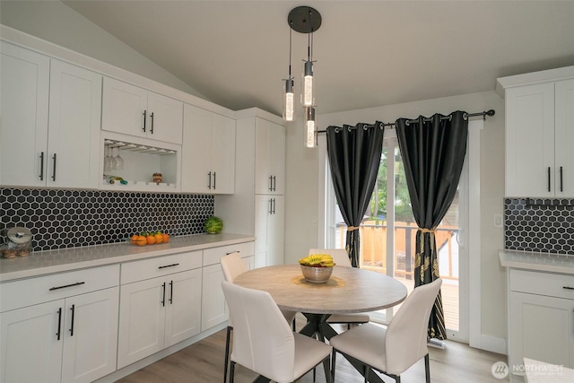 33137 35th Ave SW, Federal Way, WA 98023 - dining room featuring vaulted ceiling and light wood-style floors