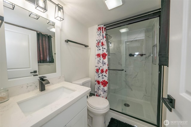 33137 35th Ave SW, Federal Way, WA 98023 - bathroom featuring a marble finish shower, toilet, and vanity