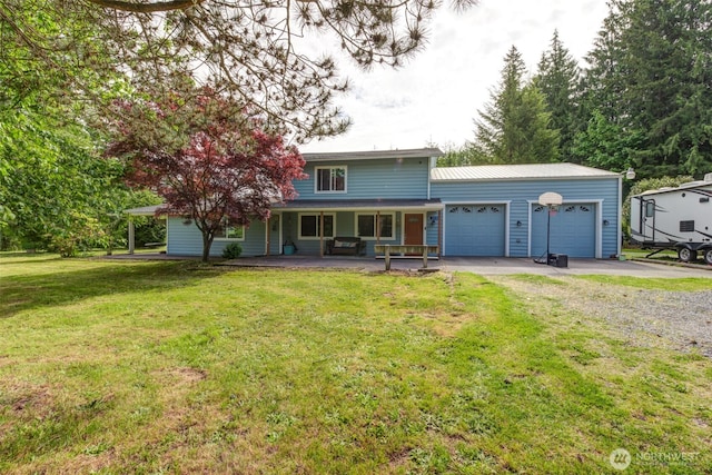 4718 252nd St NE, Arlington, WA 98223 - traditional-style home with dirt driveway, a garage, a porch, and a front lawn