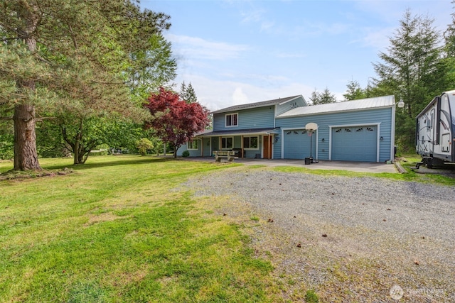 4718 252nd St NE, Arlington, WA 98223 - view of front of property with driveway, a porch, a garage, and a front lawn
