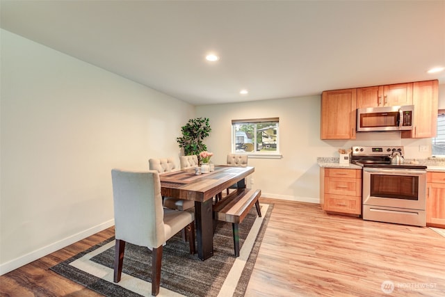 4718 252nd St NE, Arlington, WA 98223 - dining area with recessed lighting, light wood-type flooring, plenty of natural light, and baseboards