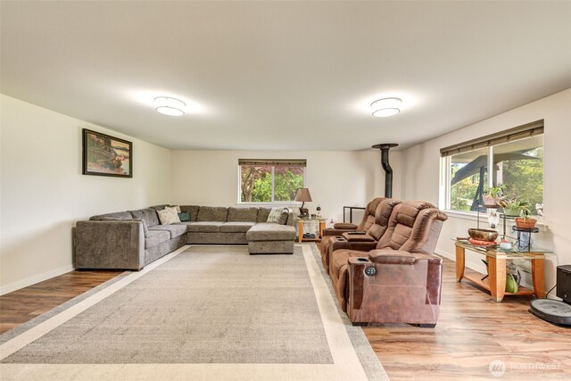 4718 252nd St NE, Arlington, WA 98223 - living area with light wood-type flooring and baseboards