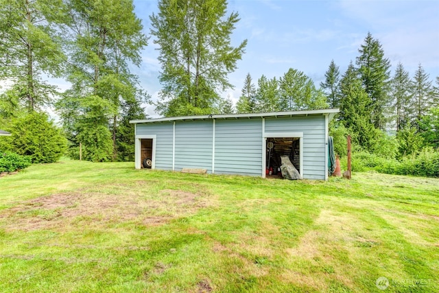 4718 252nd St NE, Arlington, WA 98223 - view of pole building with a yard