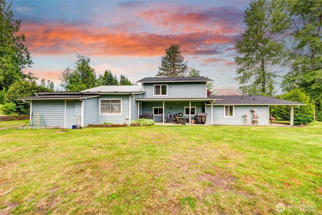 4718 252nd St NE, Arlington, WA 98223 - back of house with a yard and a patio