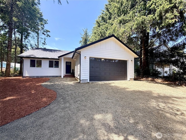 127 Olympic View Ave NE, Ocean Shores, WA 98569 - ranch-style home featuring driveway and an attached garage