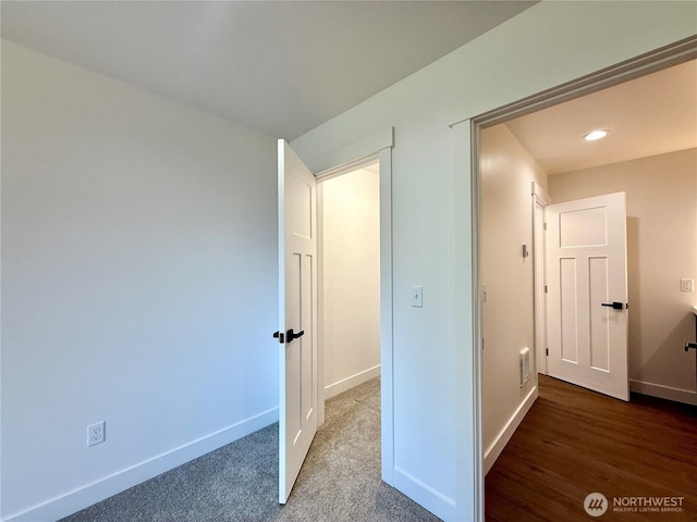 127 Olympic View Ave NE, Ocean Shores, WA 98569 - corridor featuring recessed lighting and wood finished floors