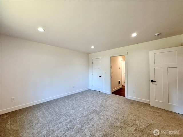 127 Olympic View Ave NE, Ocean Shores, WA 98569 - unfurnished bedroom with carpet and recessed lighting