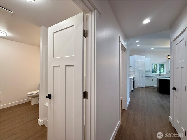 127 Olympic View Ave NE, Ocean Shores, WA 98569 - hallway featuring dark wood-style flooring and recessed lighting