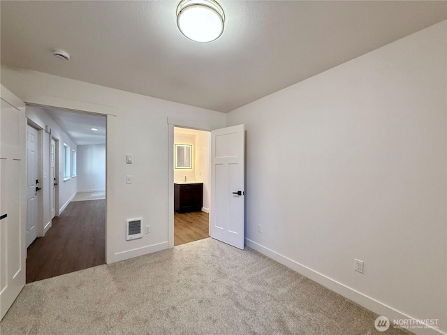 127 Olympic View Ave NE, Ocean Shores, WA 98569 - unfurnished bedroom with carpet floors and ensuite bathroom