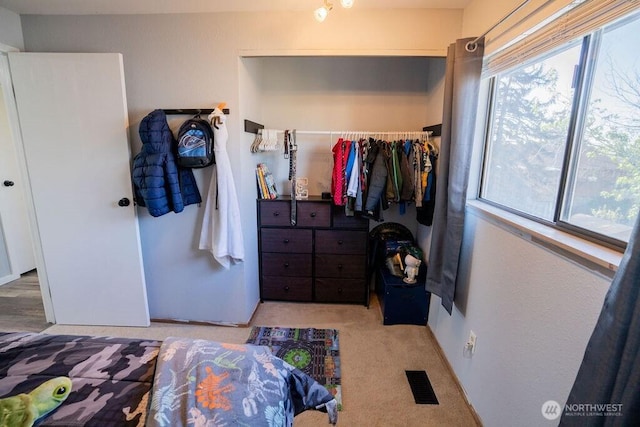 306 Belmont Ave, Moses Lake, WA 98837 - bedroom featuring a closet and light carpet