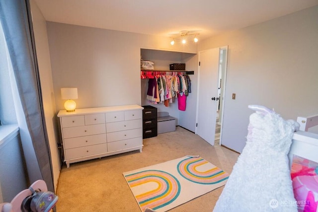 306 Belmont Ave, Moses Lake, WA 98837 - bedroom with a closet and light colored carpet