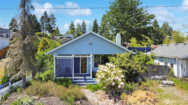 5008 N Visscher St, Tacoma, WA 98407 - rear view of property with a chimney