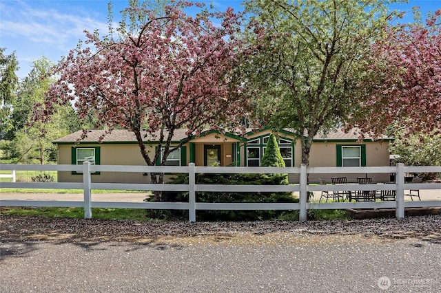 119 Oyler Way, Ethel, WA 98542 - obstructed view of property featuring a fenced front yard