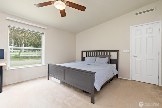 119 Oyler Way, Ethel, WA 98542 - bedroom featuring light carpet, baseboards, ceiling fan, and vaulted ceiling